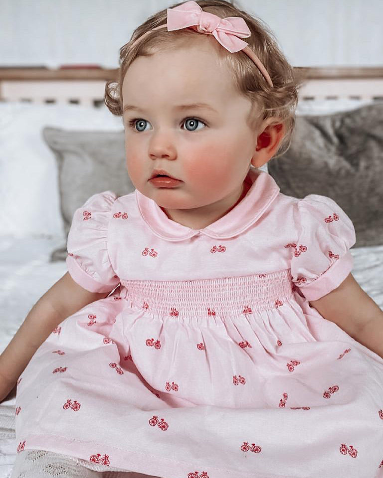 Blush pink smocked Spanish dress